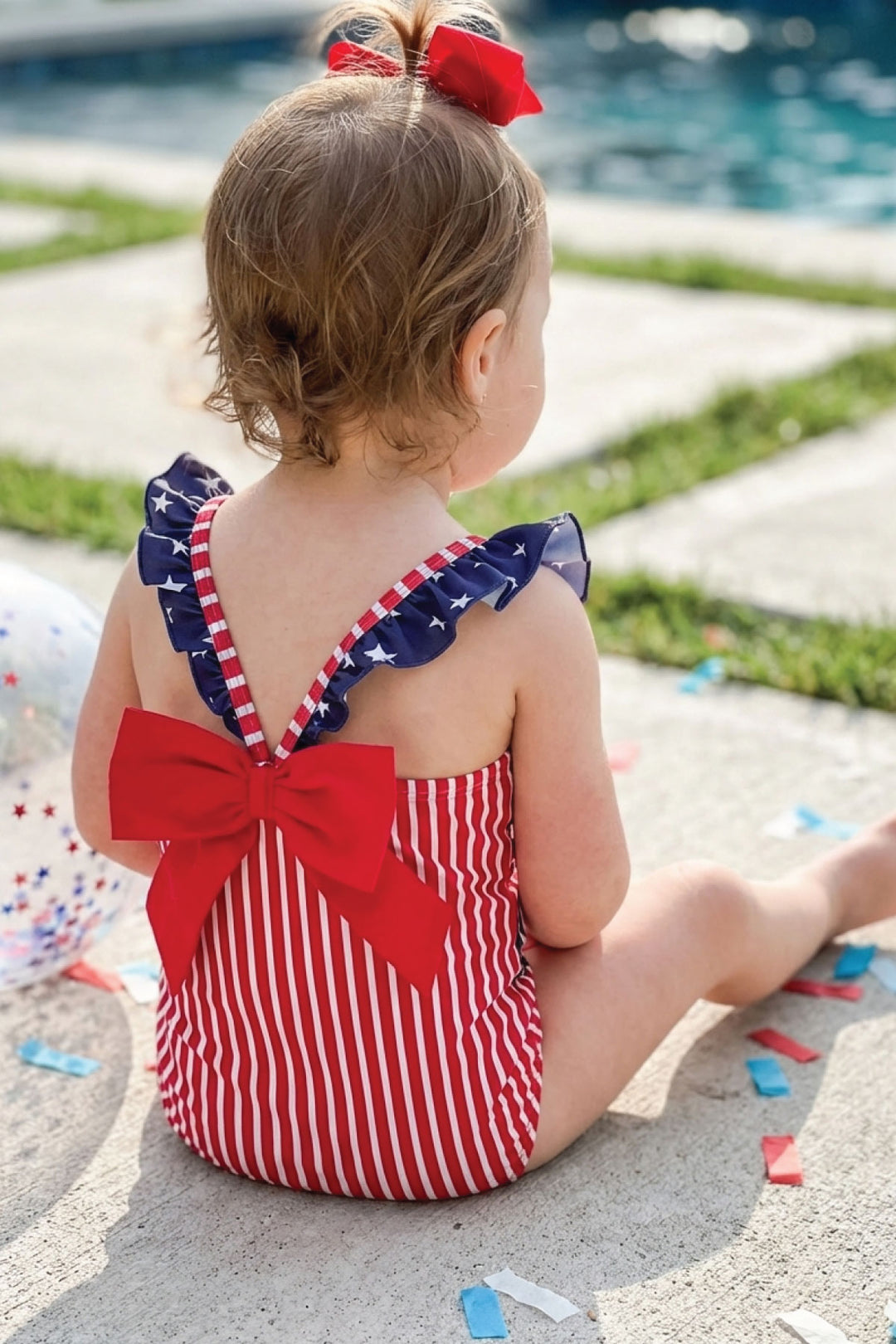 Stars & Stripes Party baby girl double ruffle bow back one piece swimsuit view 11 | 4th of July swim | Caden Lane