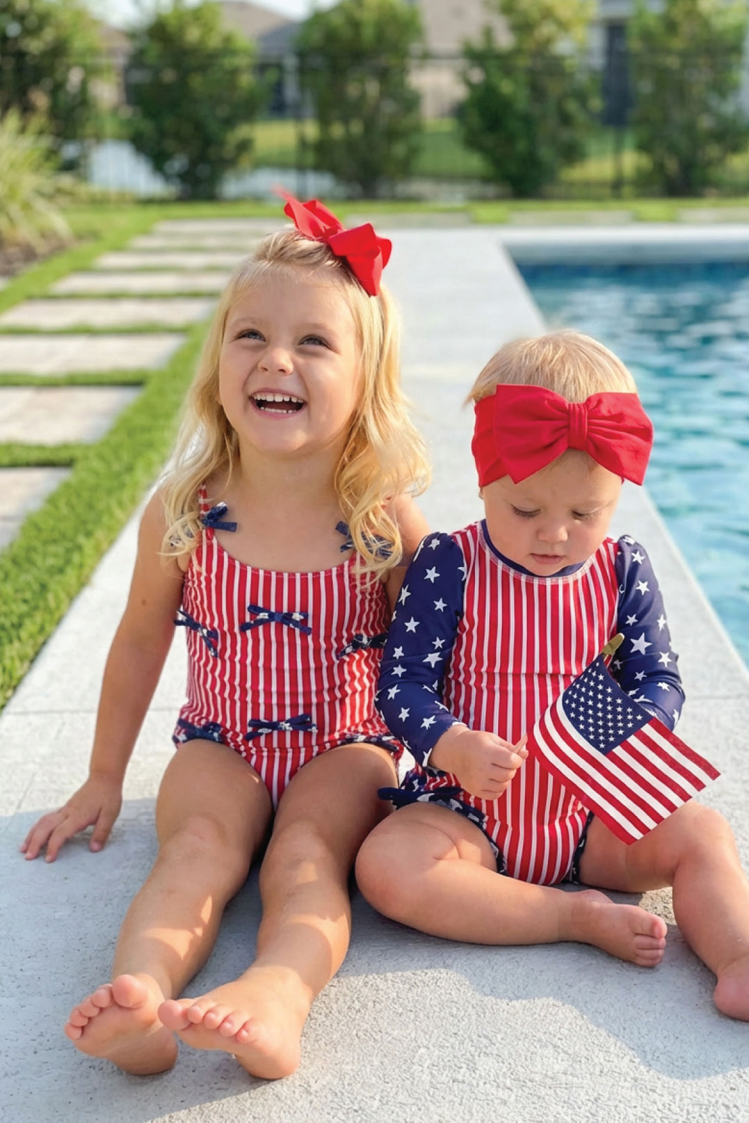 Stars & Stripes Party baby girl rash guard with ruffle bottom detail view 8 | 4th of July kids swim | Caden Lane
