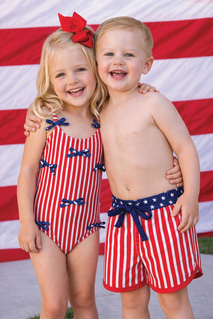 Boys swim trunks flat lay | Stars & Stripes Party | USA swim | Caden Lane