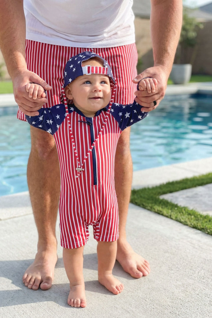 Baby rash guard swim romper shortie | Stars & Stripes Party 4th of July swimwear | UPF 50+ sun protection | Caden Lane