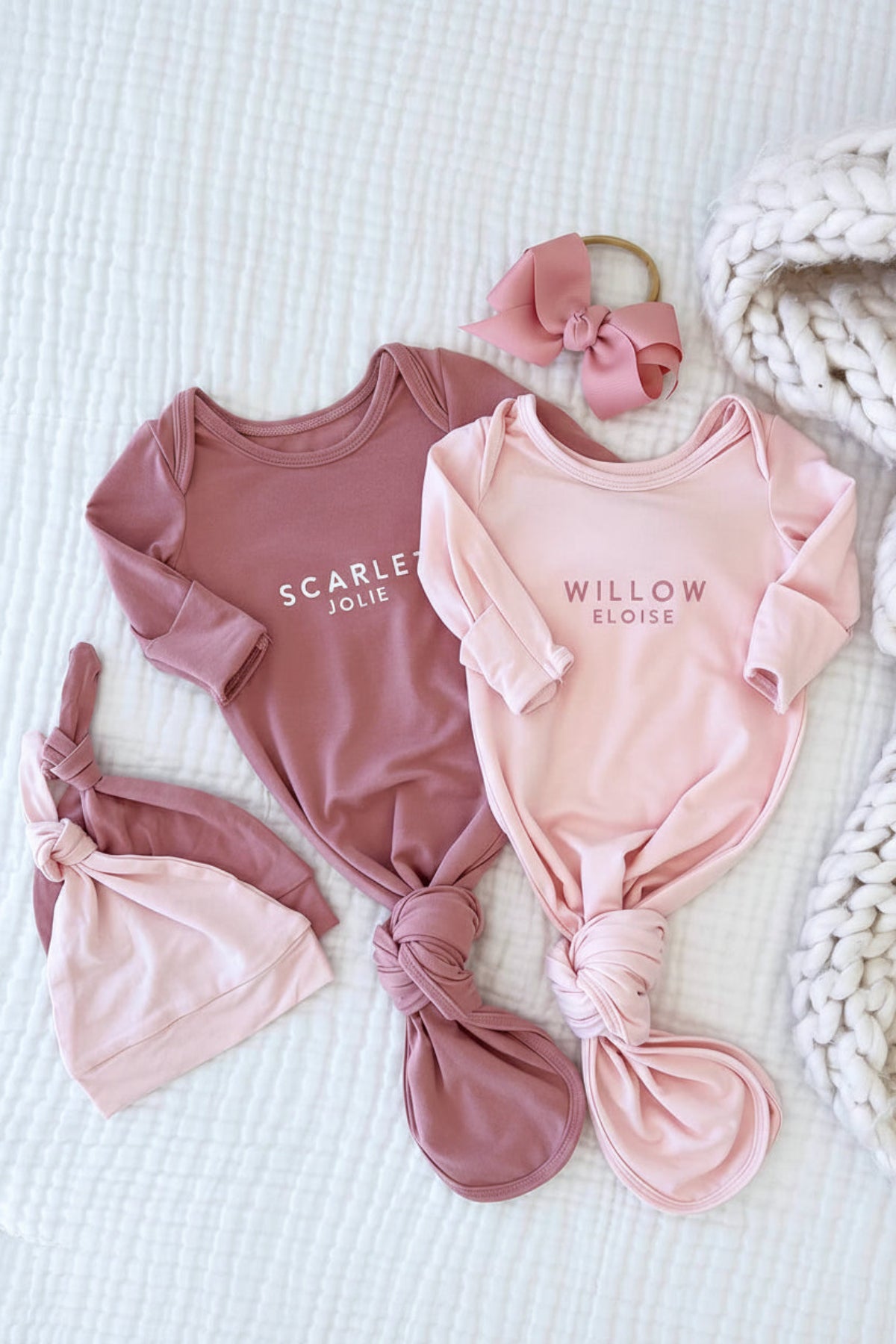 Caden Lane personalized knot gowns in mauve and blush pink featuring "Scarlet Jolie" and "Willow Eloise" in modern block lettering, paired with a matching knotted baby hat and bow headband.