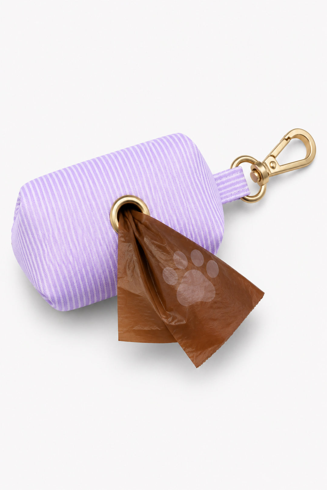 Lavender woven waste bag holder with a paw-print brown bag being dispensed from the bottom opening, with gold carabiner clip