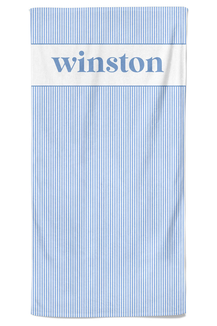 Morning Mist light blue and white striped personalized pet towel with Winston printed in navy serif font on white panel at top, full product shot on white background