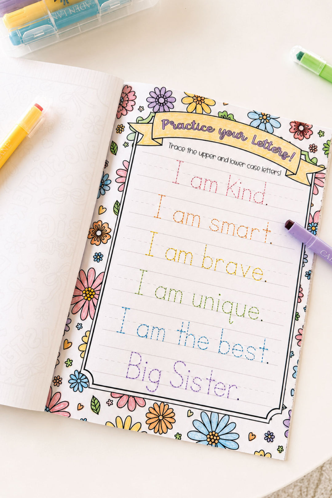 Interior page of the Caden Lane Best Big Sister coloring book showing a "Practice Your Letters" tracing activity with affirmations like "I am kind" and "I am brave."