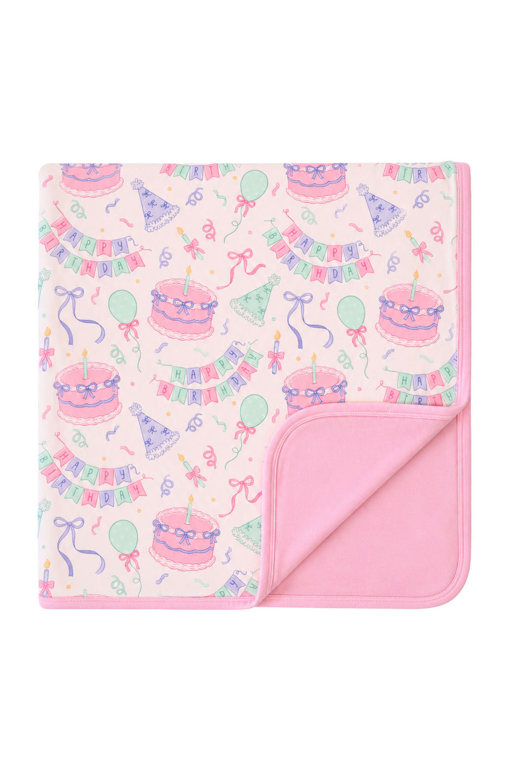 A Caden Lane blanket with a pastel birthday party pattern on a white background, featuring pink cakes, balloons, banners, and party hats, with a solid pink reverse side.