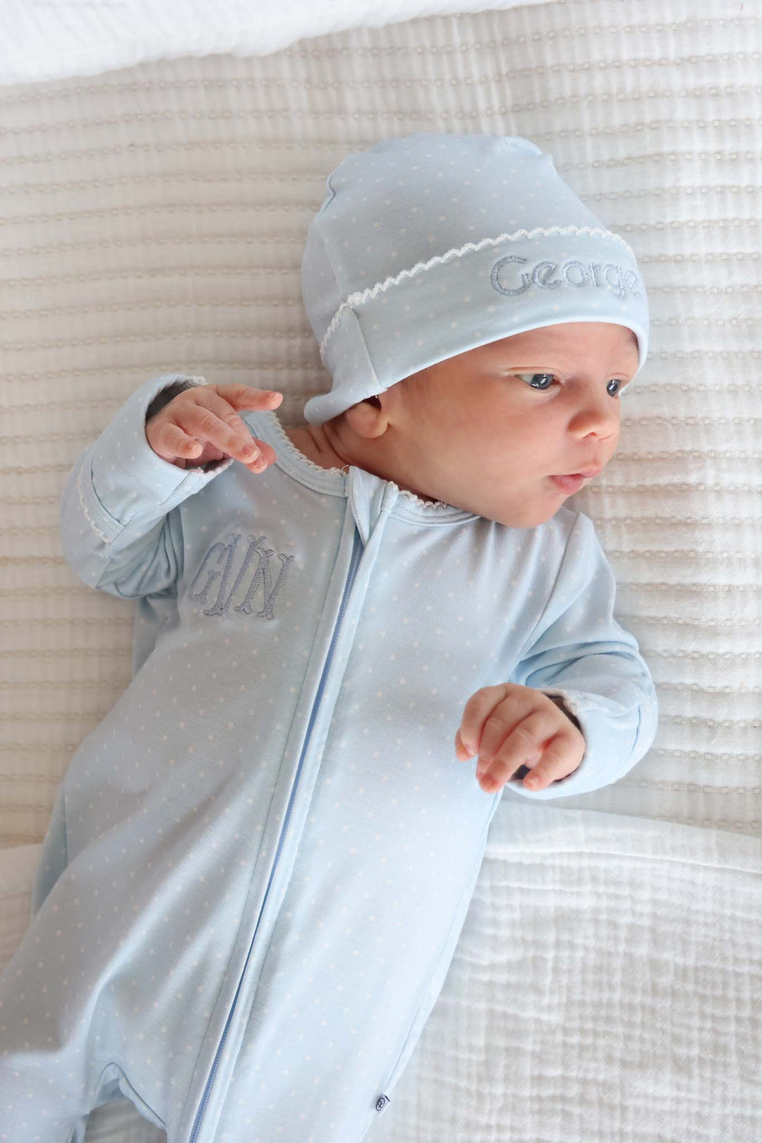 close-up of blue picot trim bamboo footie for babies