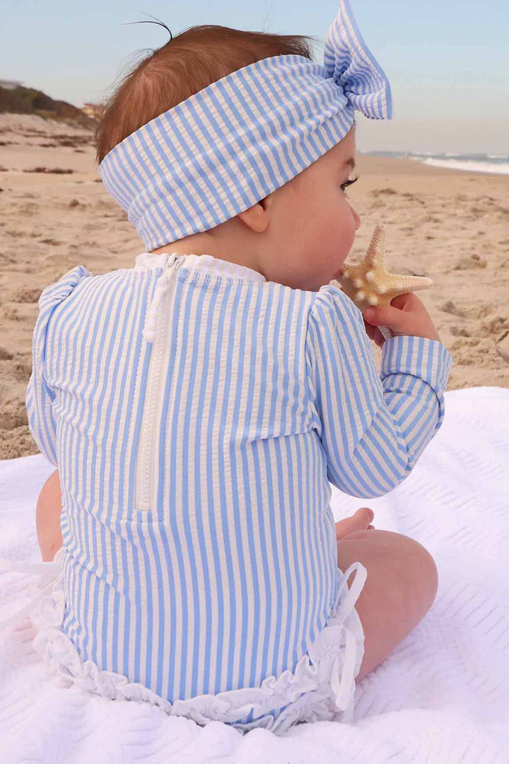 blue seersucker ruffle butt rash guard 