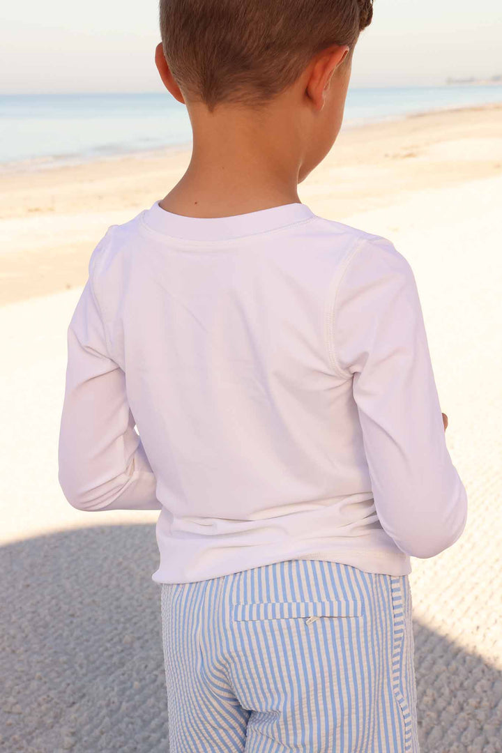 back view of white long sleeve rash guard shirt 