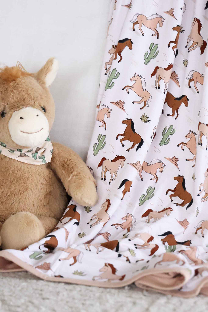 neutral pony and cactus double sided bamboo blanket 
