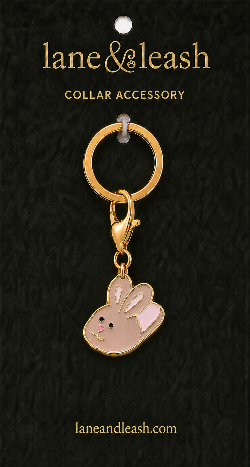 Pink bunny slipper Lane & Leash collar accessory charm displayed on dark green packaging card with lobster claw clasp and jump ring