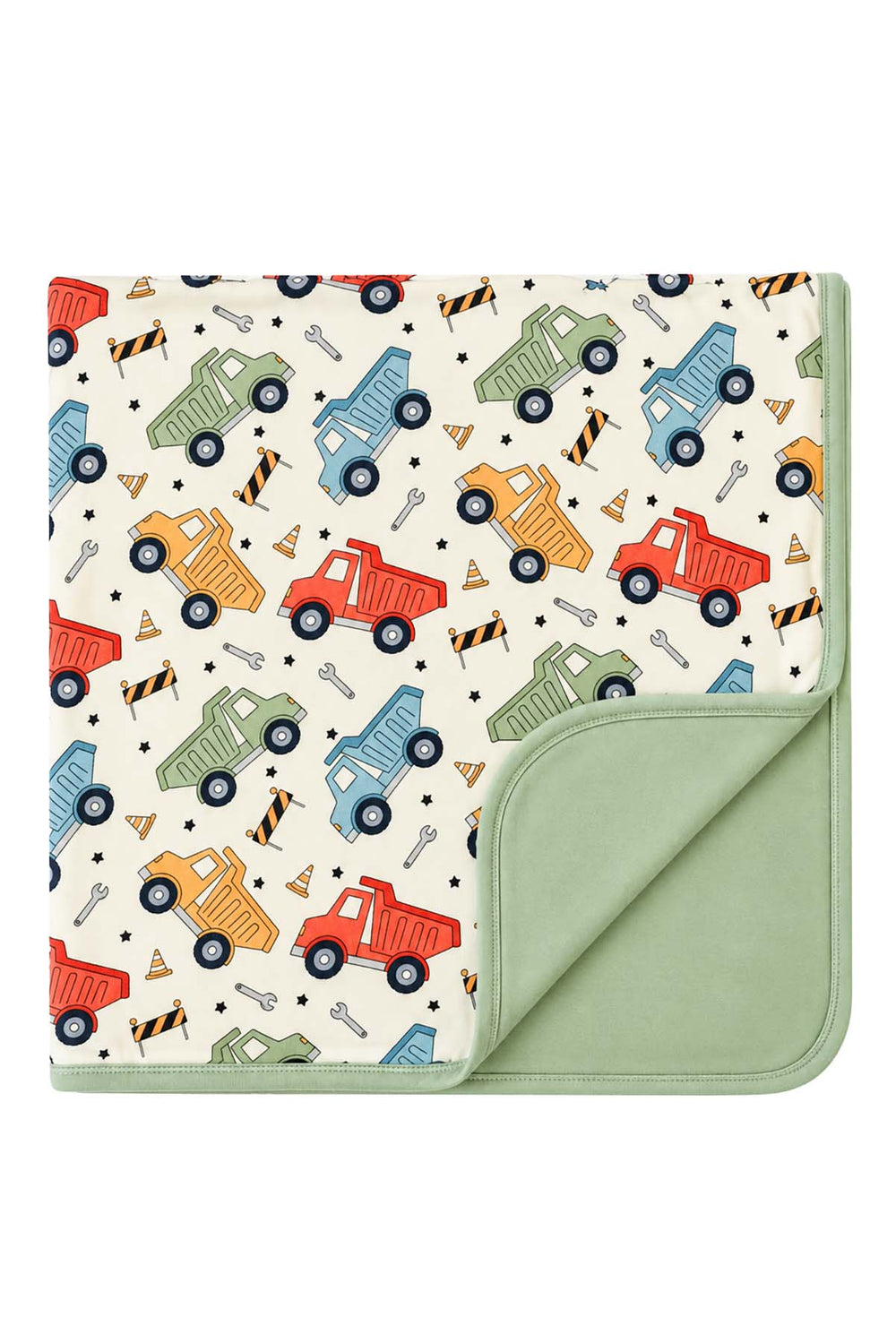 Flat lay of a folded Caden Lane cream knit blanket in a Busy Builder print featuring dump trucks and wrenches, with one corner turned back to show a sage reverse.