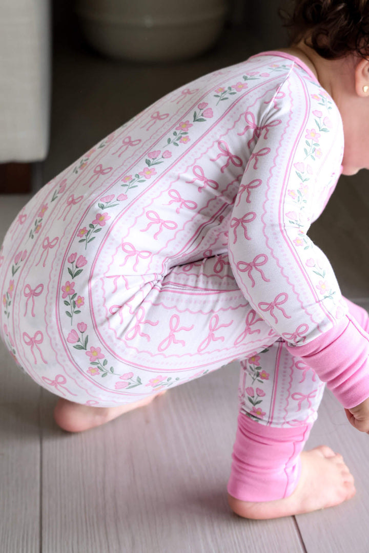 bamboo baby convertible zip romper with coquette garden bow and floral details