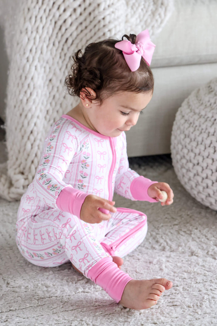 caden lane convertible zip romper coquette garden print - bows and flowers for babies