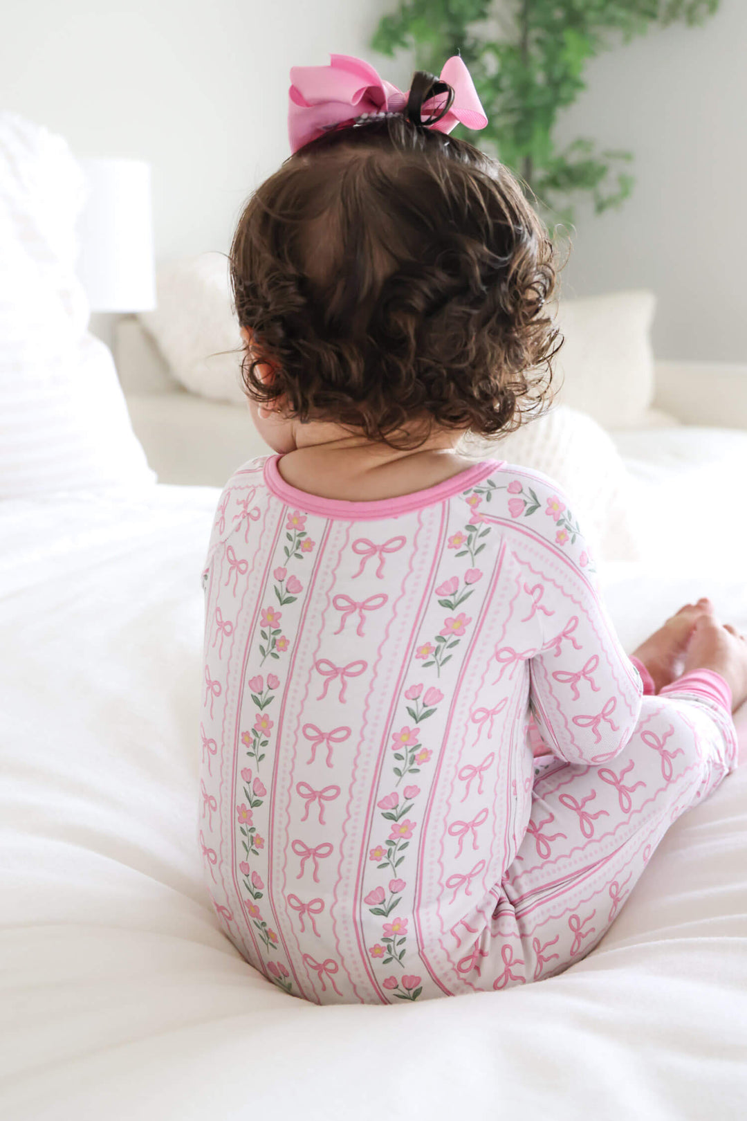 newborn convertible zip romper in coquette garden floral and bow print