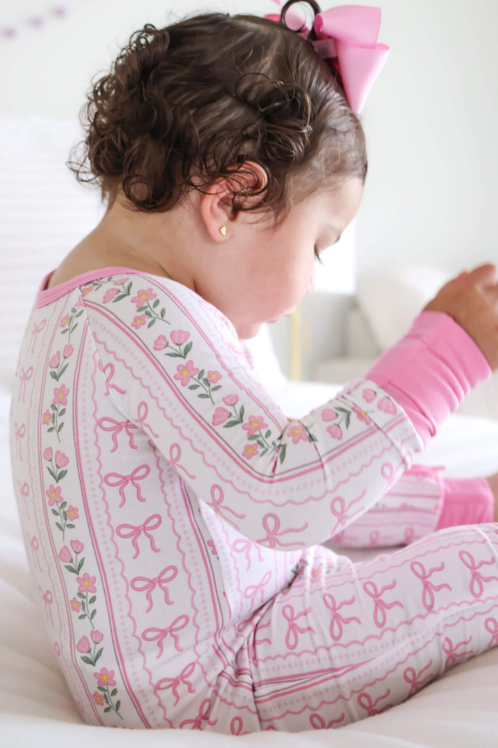 caden lane convertible zip romper in coquette garden floral print for newborns