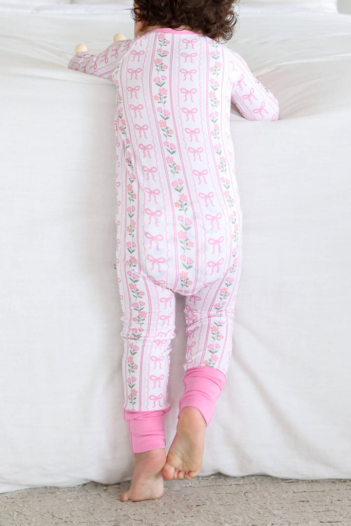 baby convertible zip romper featuring coquette garden bows and flowers