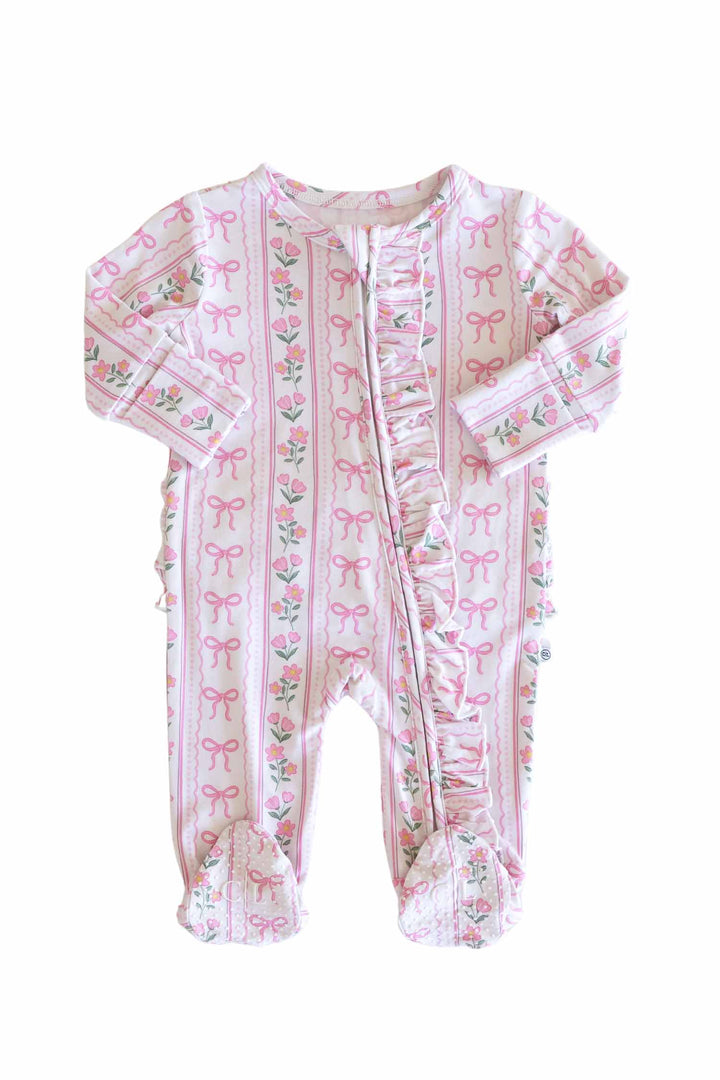 bamboo ruffle zipper footie with coquette garden bow and flower print