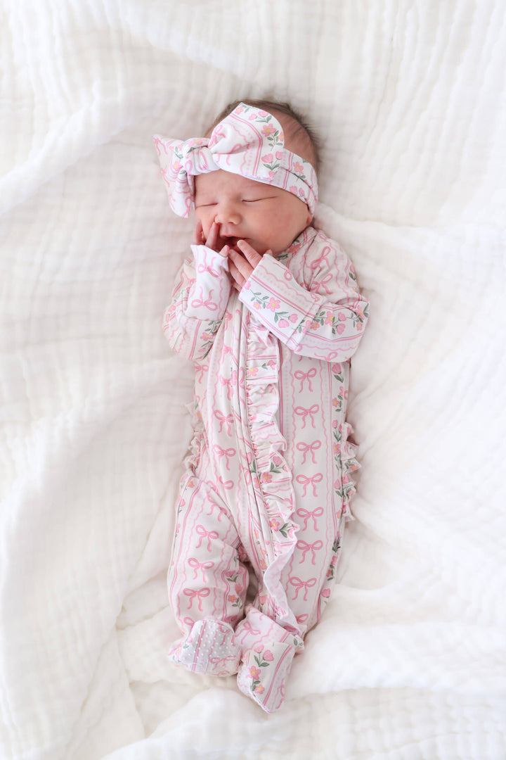 caden lane ruffle zipper footie coquette garden print - bows and flowers for babies