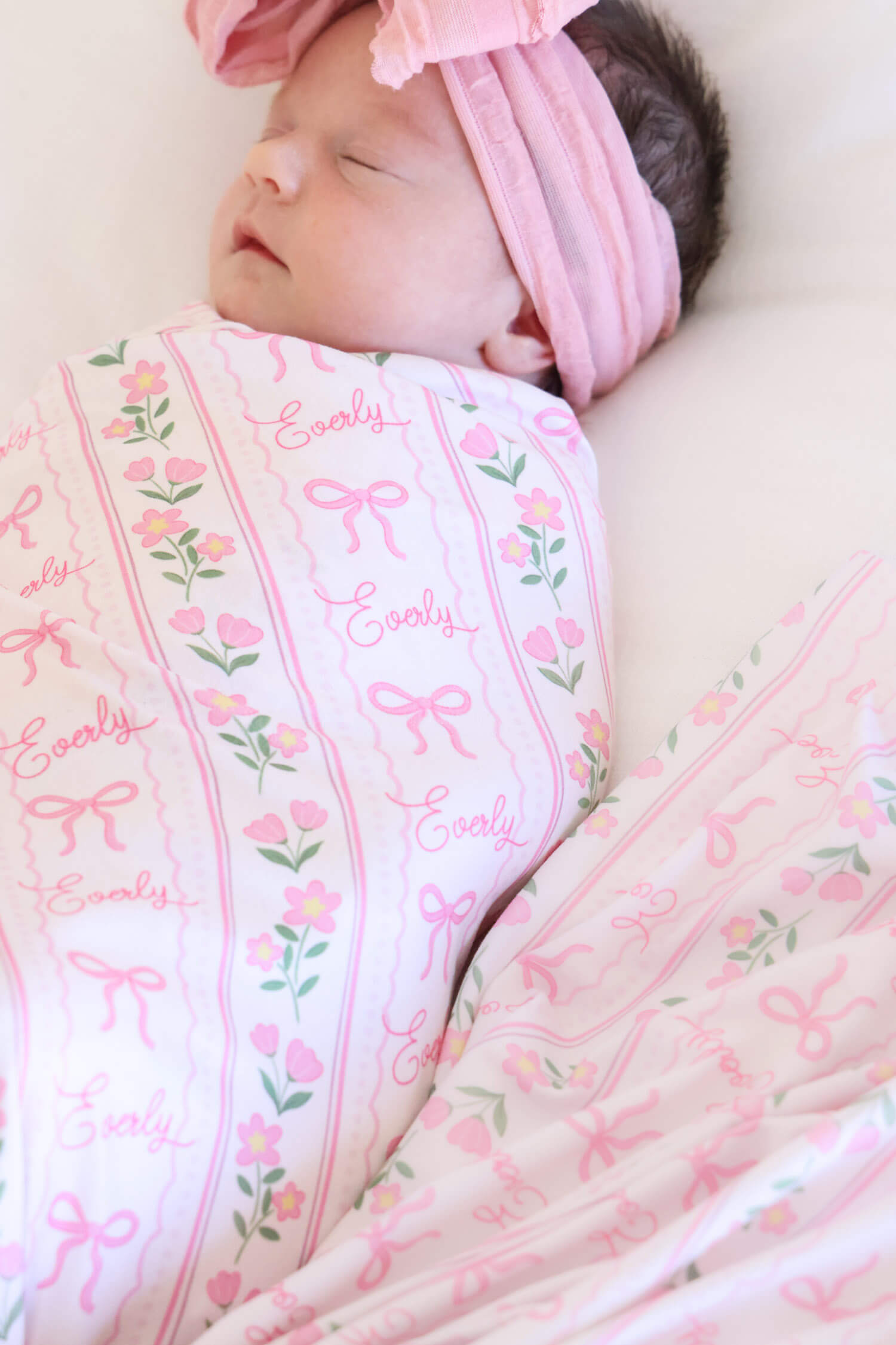 caden lane coquette garden personalized swaddle blanket with bows and flower details