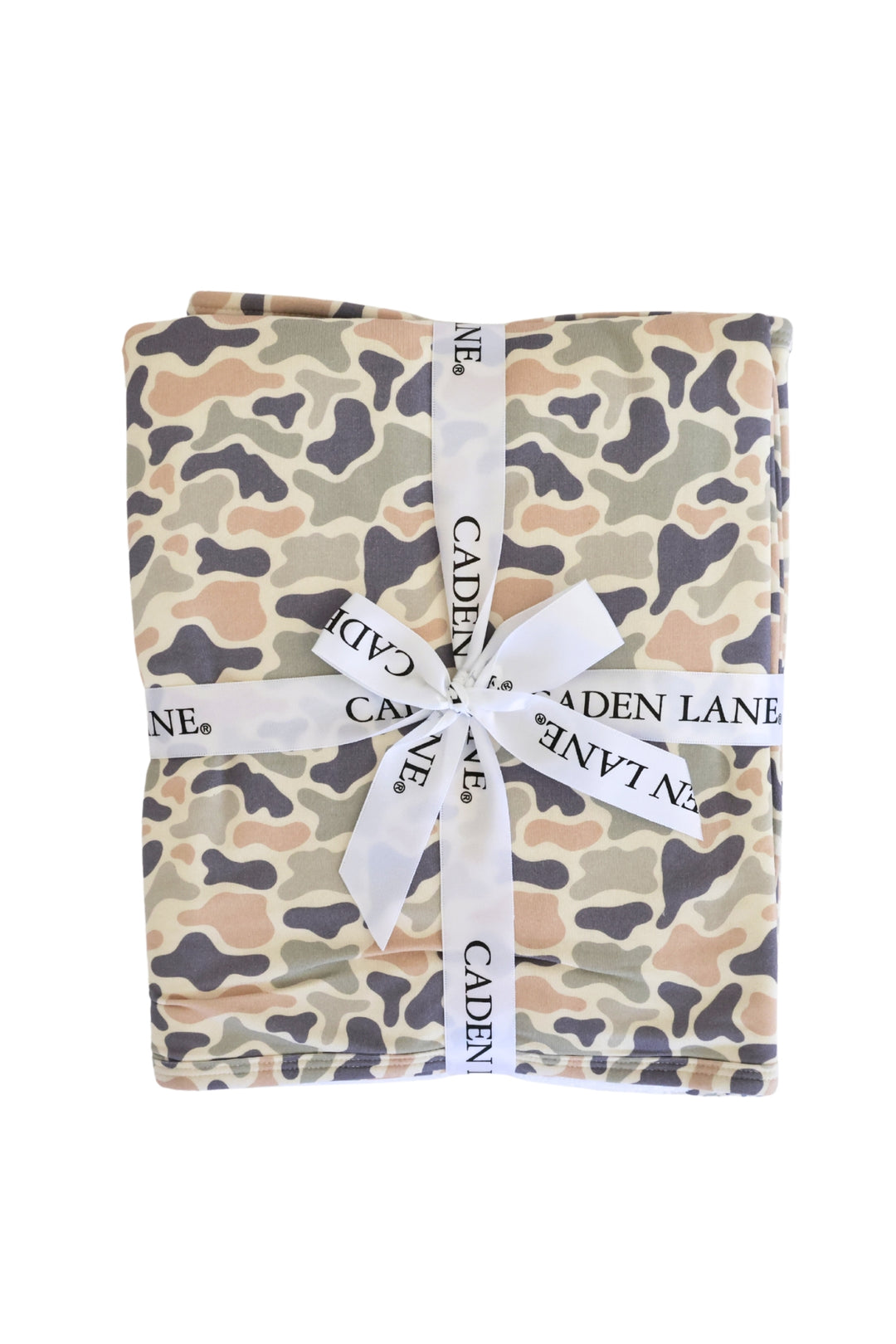 Camo cutie bamboo hooded towel folded and tied with a Caden Lane ribbon bow, ready for gifting