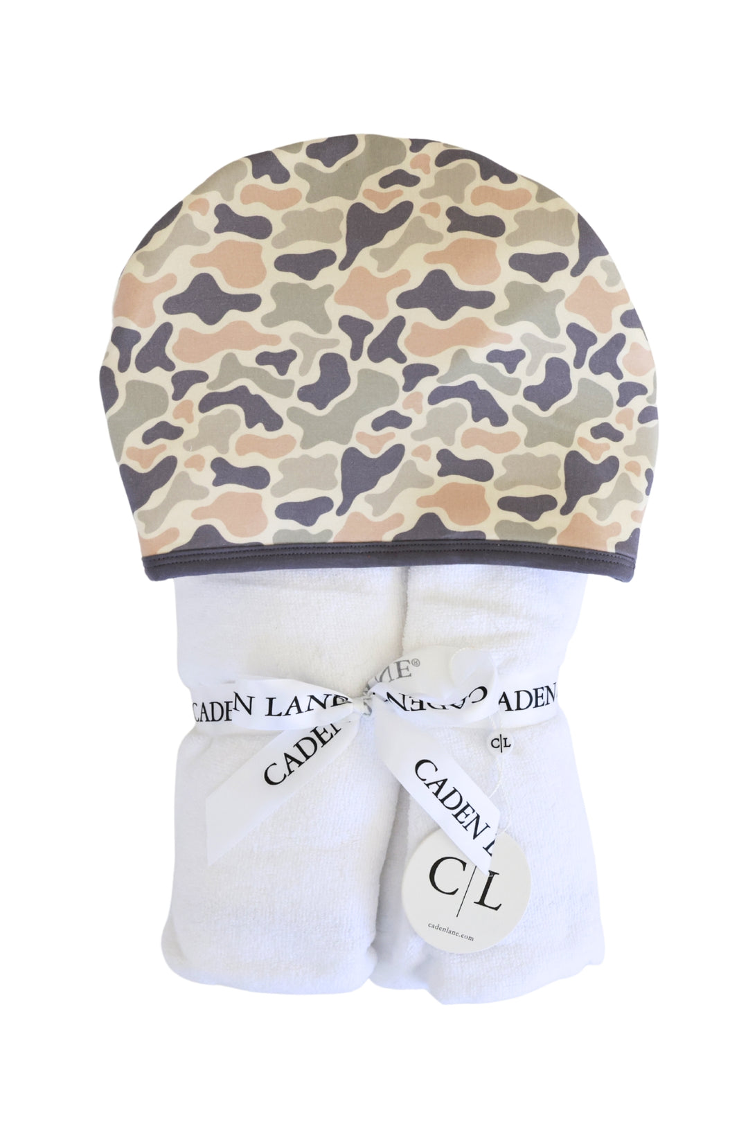 Caden Lane bamboo hooded towel folded with camo print hood in tan, brown, and gray, with Caden Lane logo tag