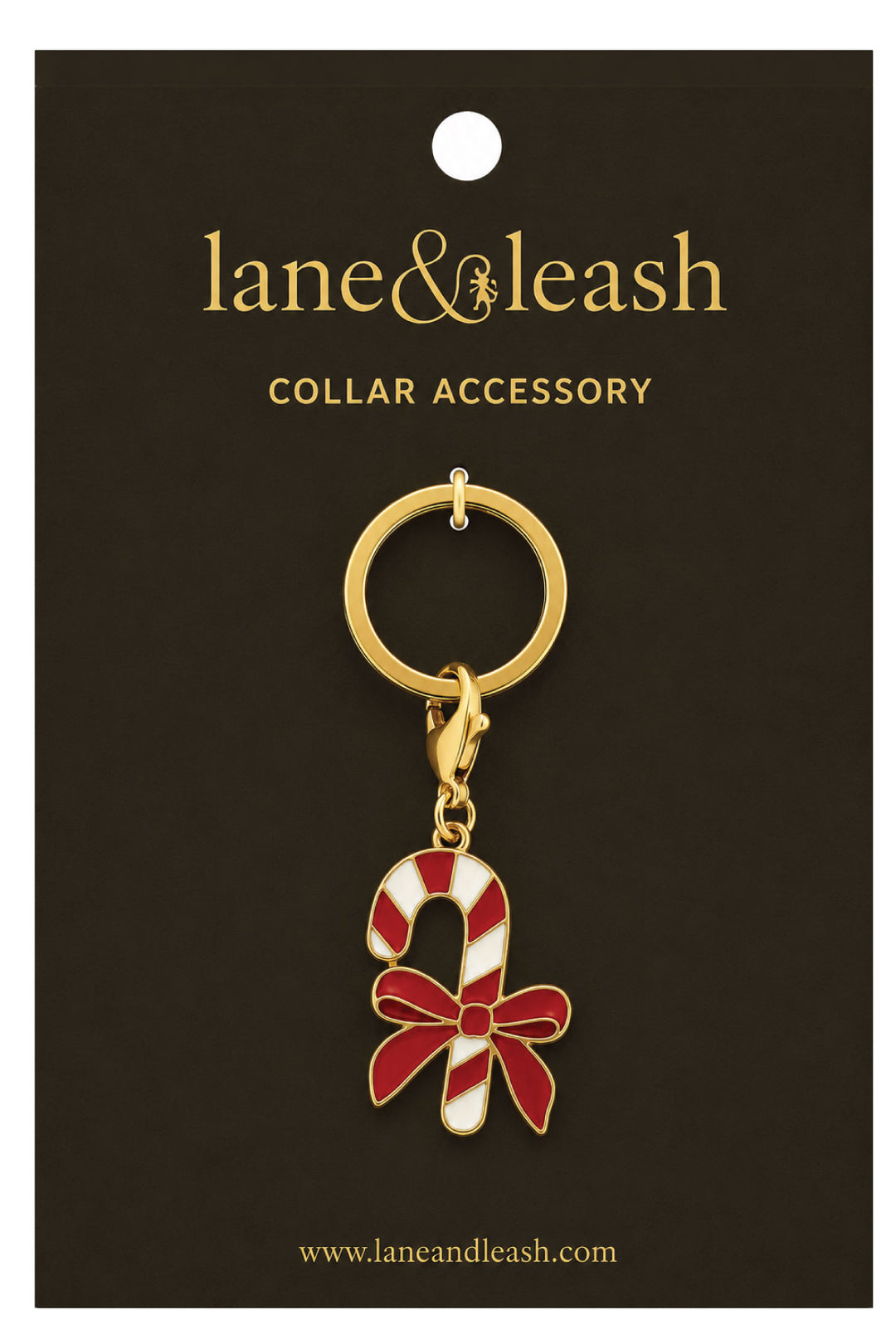 Lane & Leash candy cane bow charm collar accessory on branded packaging card, gold ring with lobster clasp and enamel candy cane charm with red bow
