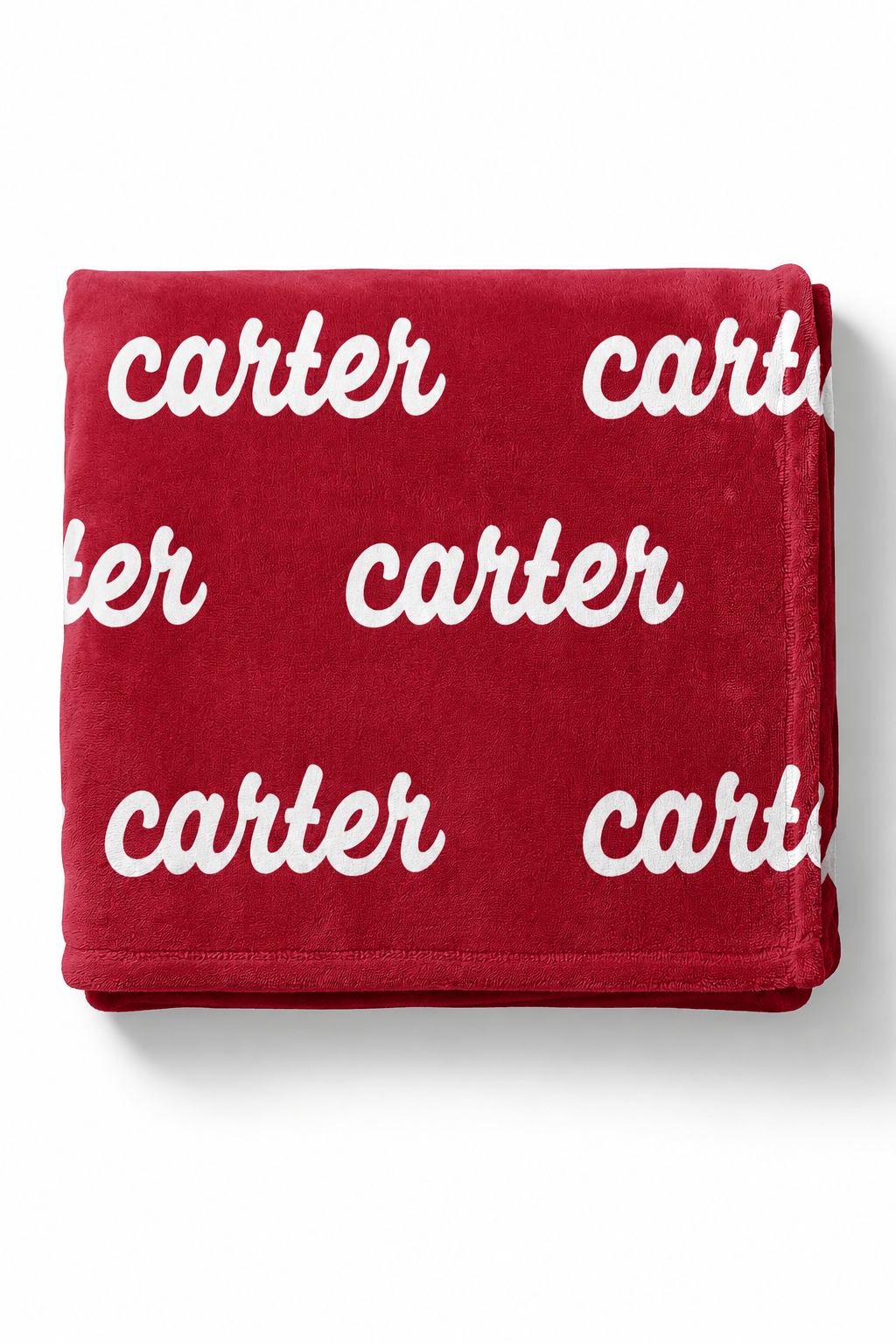 A folded red plush throw blanket featuring the word 'carter' printed repeatedly in white script across the surface, shown on a clean white background.