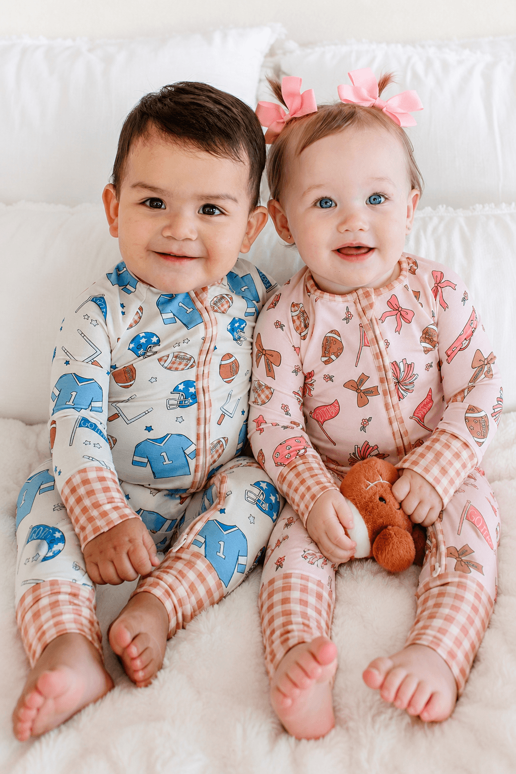 babies wearing the huddles & cuddles zip rompers