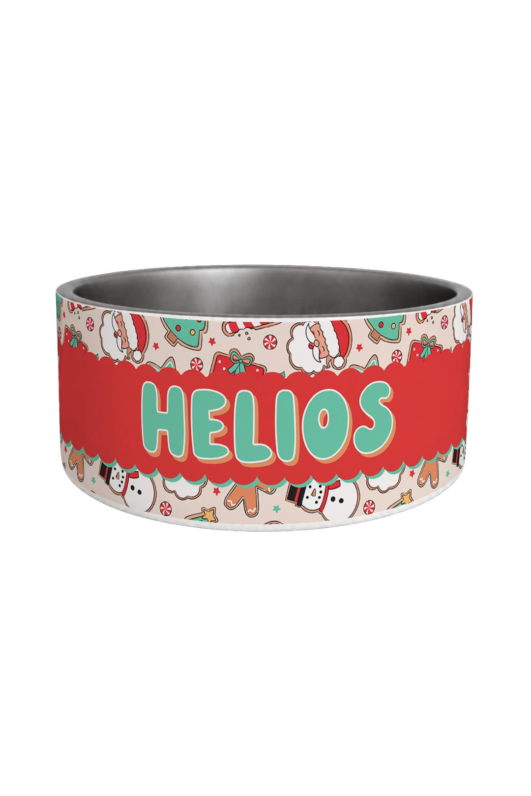 A Lane & Leash pet bowl with a stainless steel interior and a festive Christmas-themed wraparound band. The band features a red central section with the name 'HELIOS' in large green letters, surrounded by a cream background pattern with snowmen, Santa hats, gingerbread cookies, and other holiday motifs.