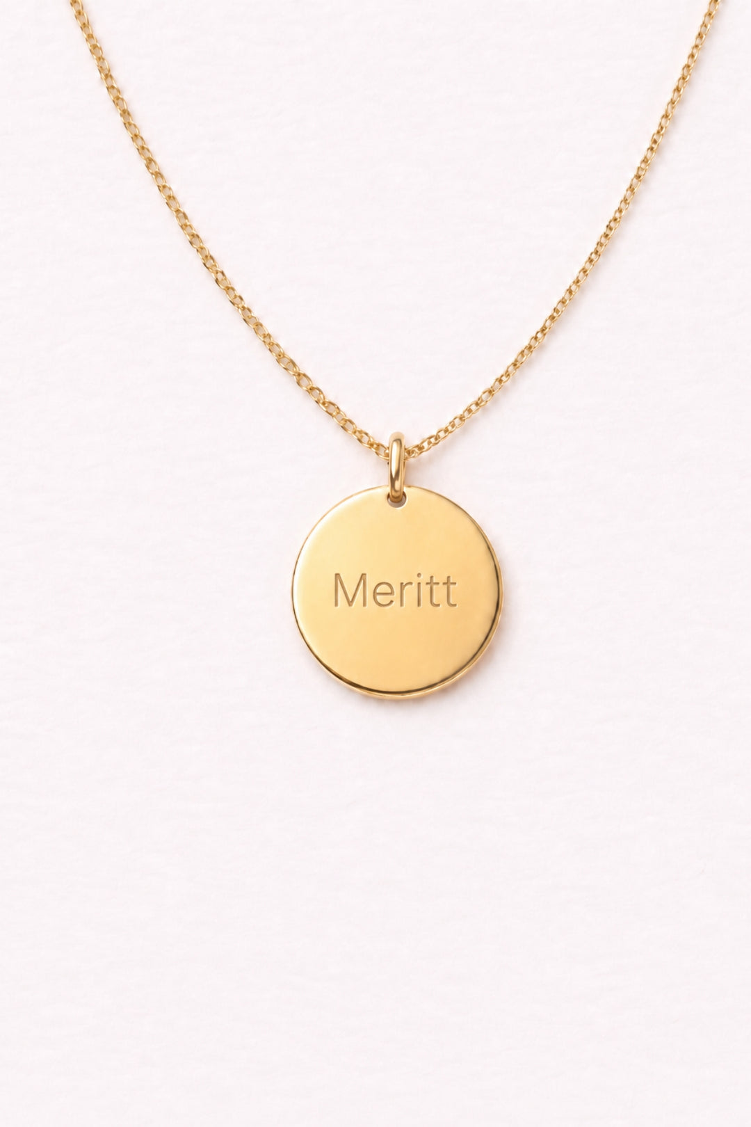 Caden Lane gold necklace with engraved "Meritt" circle disc pendant