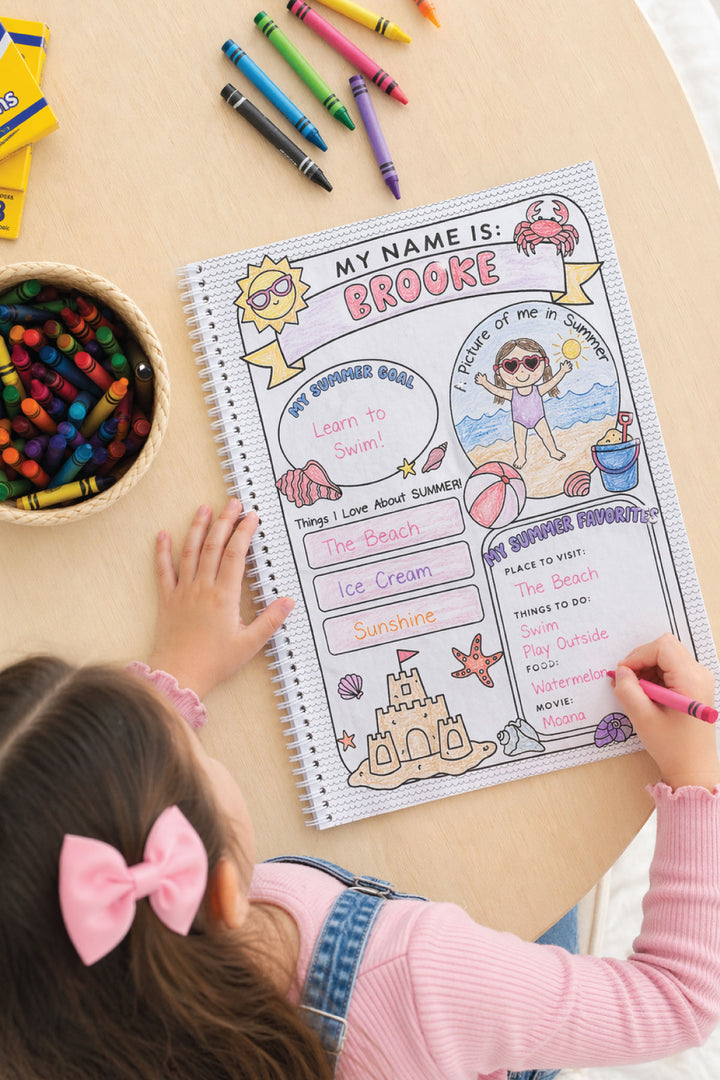 Child filling in a personalized 'My Name Is Brooke' summer activity page in a Caden Lane coloring book, with fill-in sections for summer goals and favorites