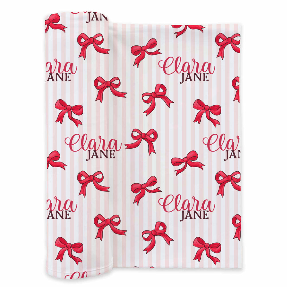 pink and white stripe with red bow personalized name swaddle christmas 
