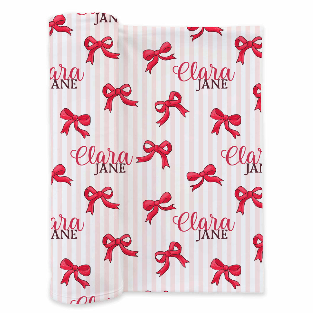 pink and white stripe with red bow personalized name swaddle christmas 