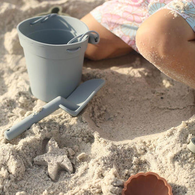 blue silicone beach bucket with sand molds 