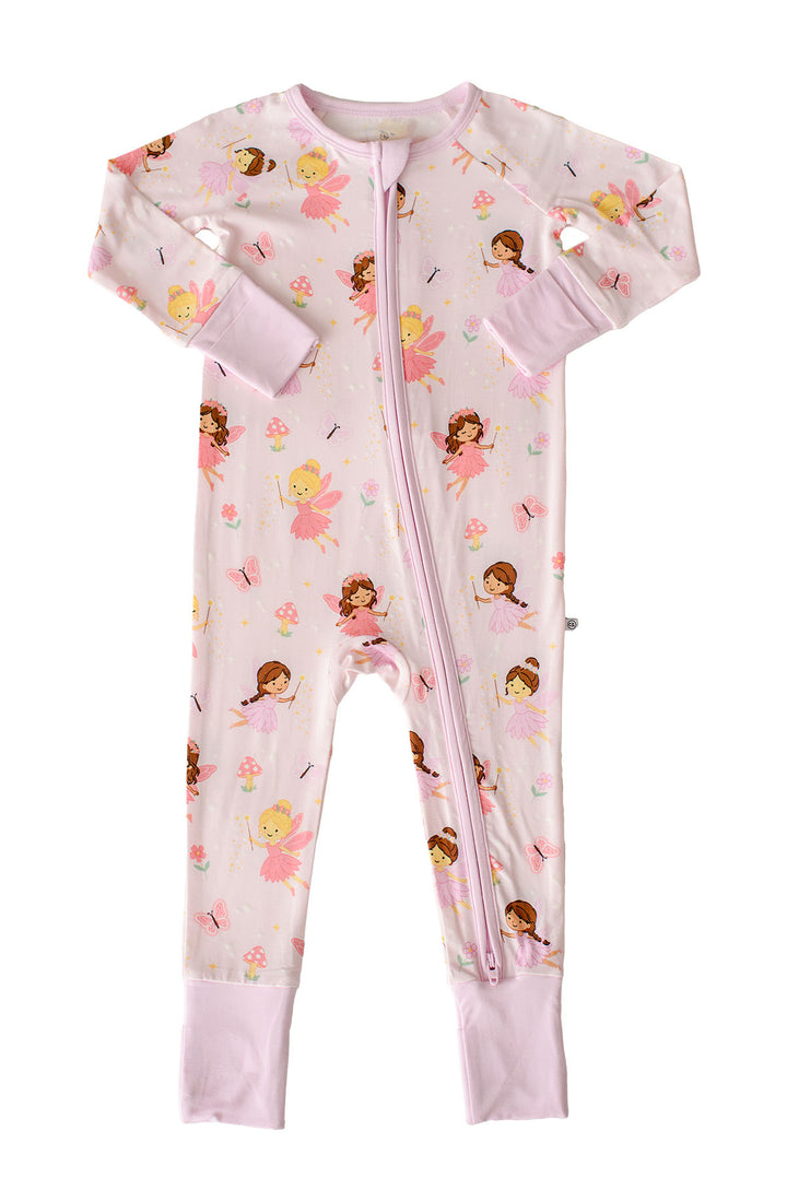 Flat lay of the Fairy Wishes glow-in-the-dark convertible bamboo zip romper in light pink fairy print with fold-over cuffs