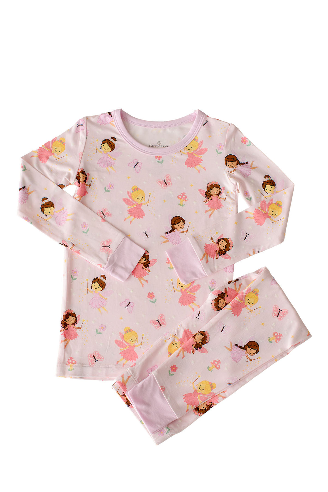 Flat lay of the Fairy Wishes glow-in-the-dark bamboo pajama top and pants with pink cuffs and all-over fairy print