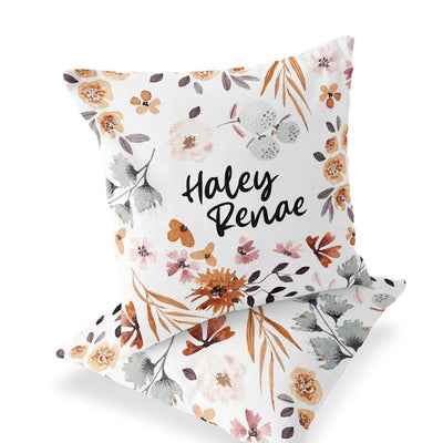 blue and orange floral accent pillow for nursery