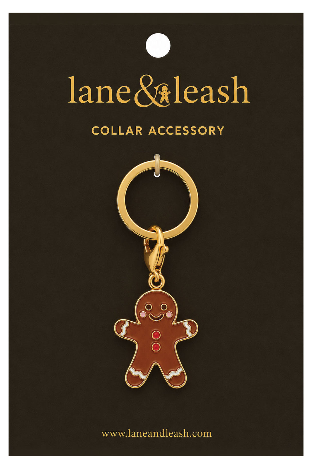 Lane & Leash gingerbread man charm collar accessory on branded packaging card, gold ring with lobster clasp and enamel gingerbread man charm