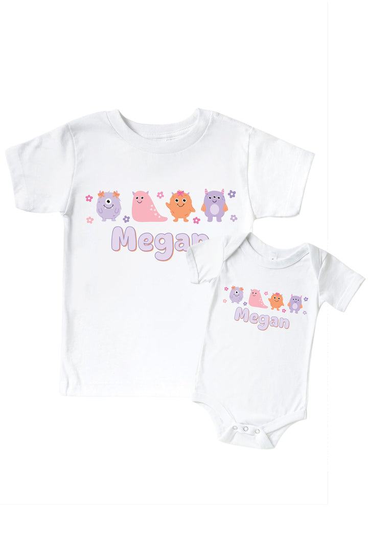 Caden Lane matching white "Megan" t-shirt and onesie set with a row of pink, purple, and orange cartoon monsters and flowers