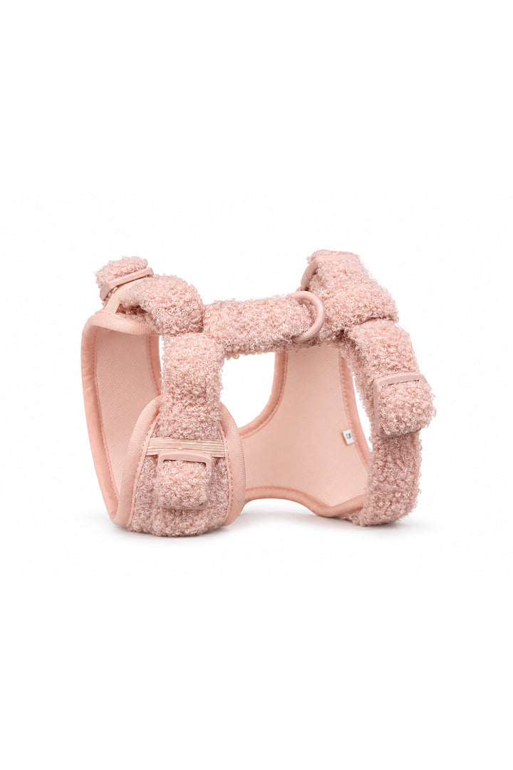 A Lane & Leash light pink plush fleece dog harness with adjustable straps and a matching pink plastic buckle, shown on a clean white background.