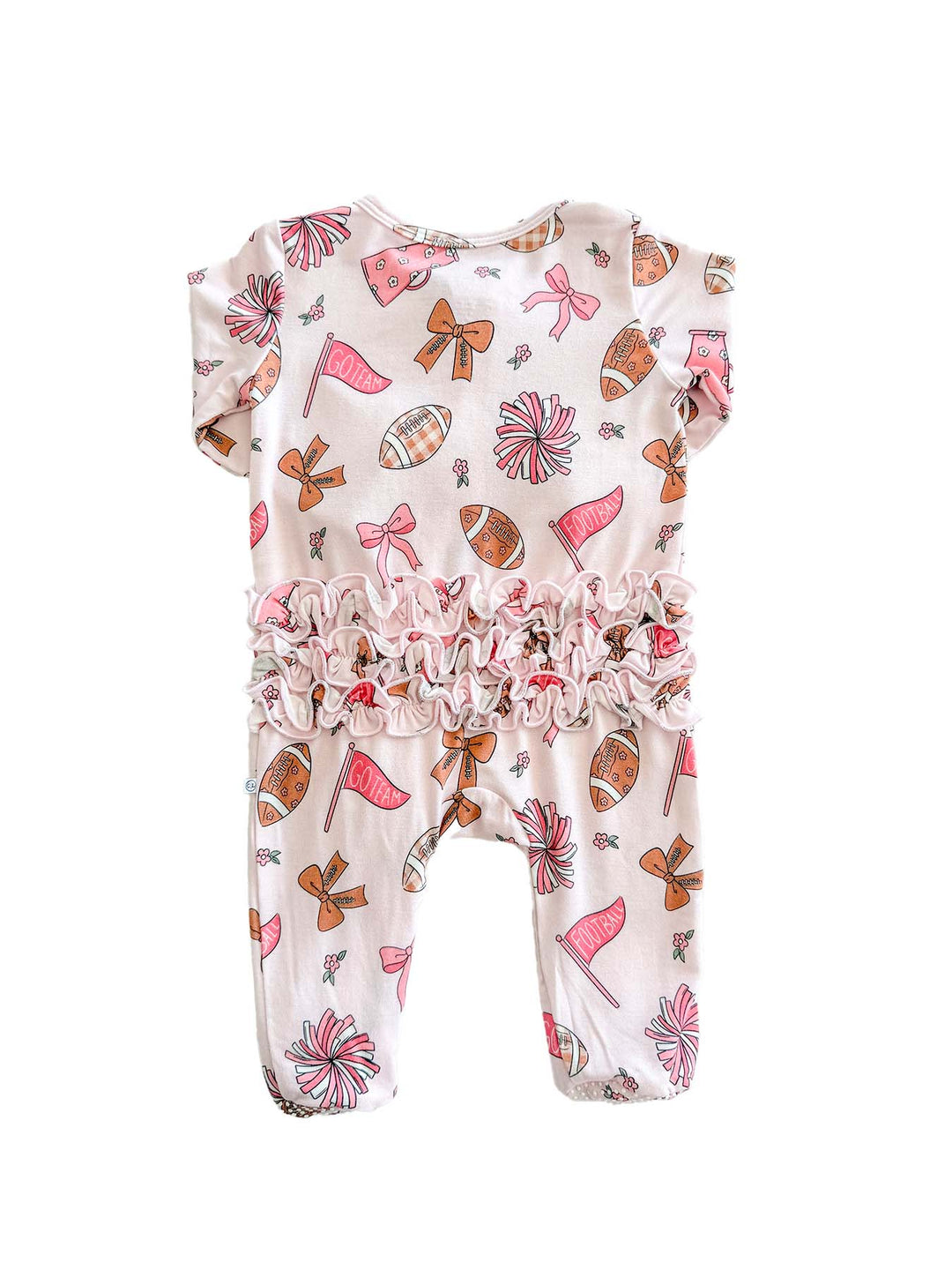A baby romper in a light pink color with a playful print of pink flags, brown bows, and footballs, featuring a ruffled elastic waistband.