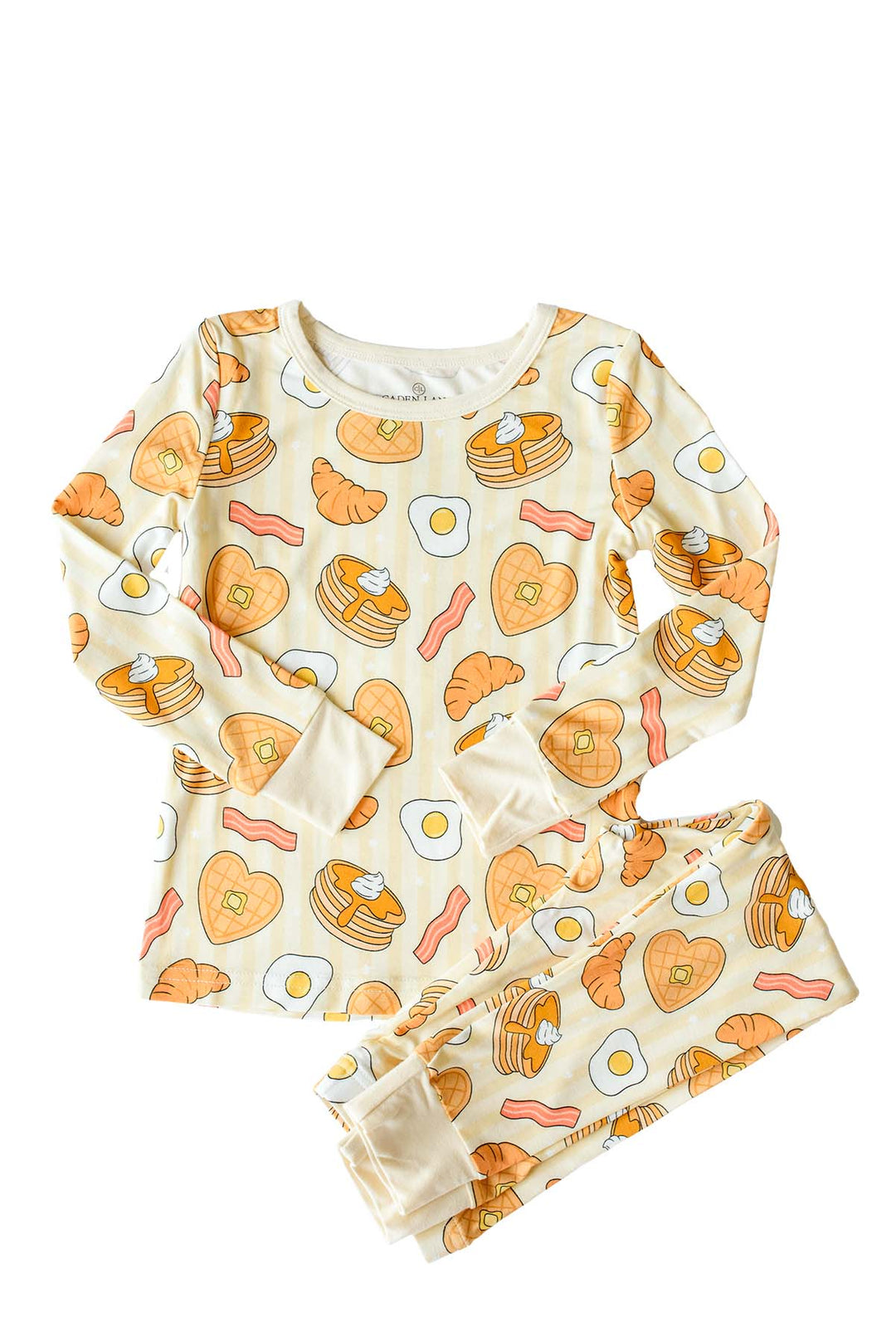Caden Lane I Love You A Brunch kids' two-piece pajama set, flat lay – pancakes, eggs, bacon and croissant print on yellow stripe