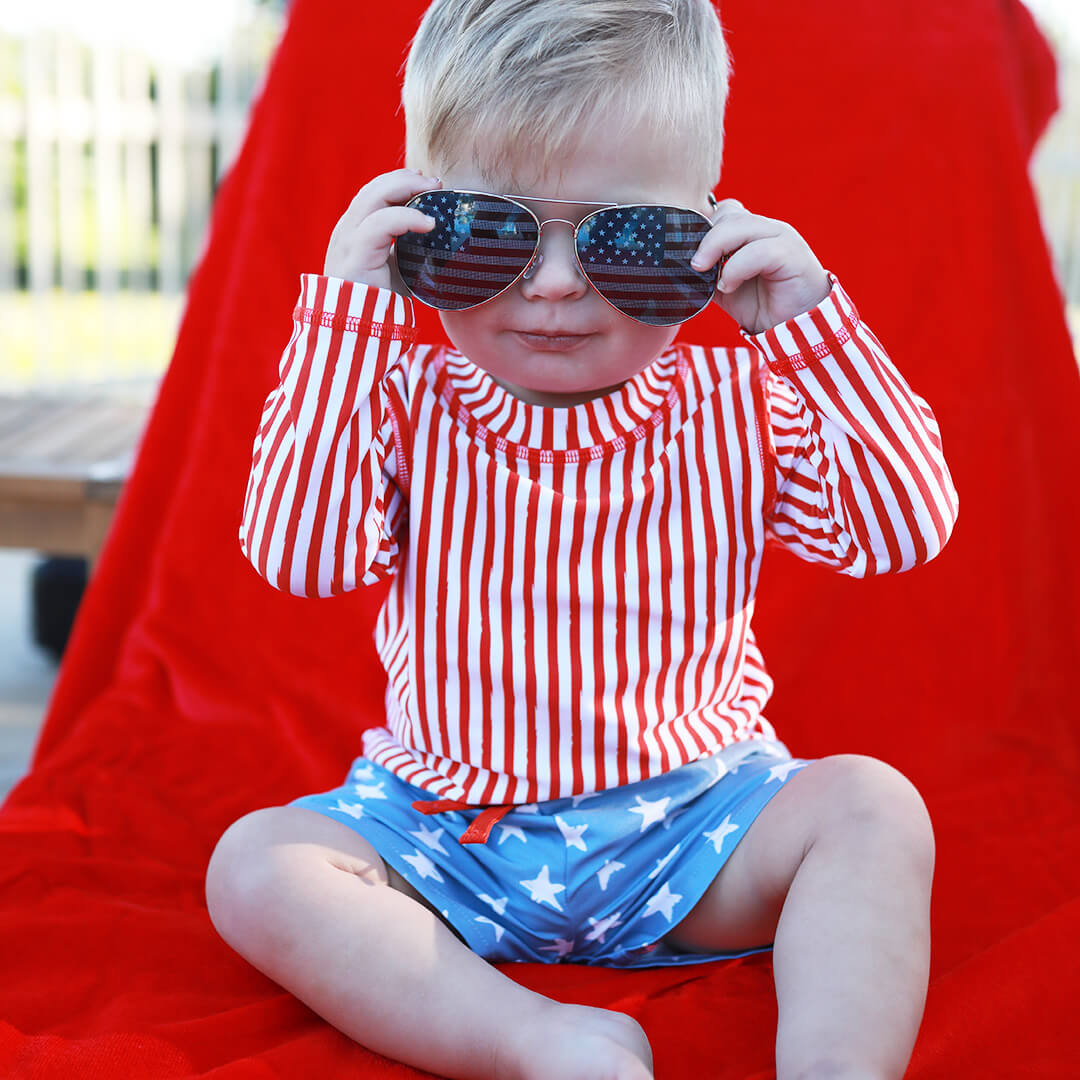 red and white striped long sleeve rash guard shirt for boys