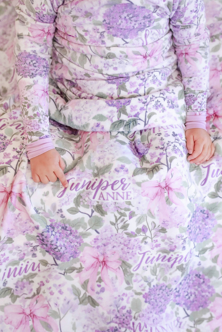 closeup of lavender lullaby personalized blanket for girls 
