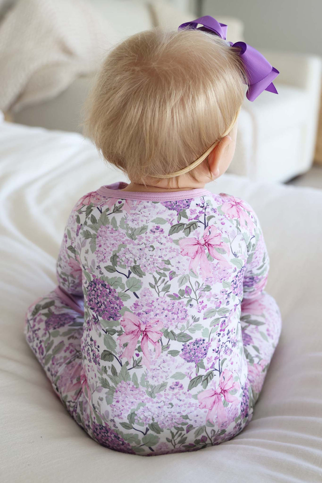 back view of lavender lullaby convertible zip romper 