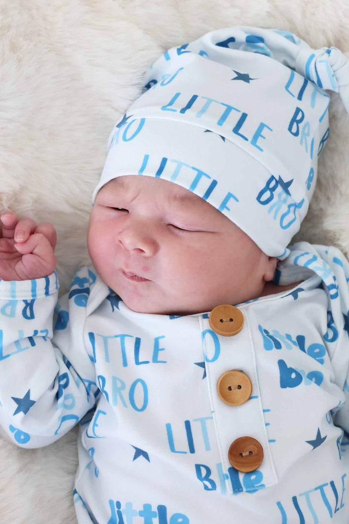 closeup of blue little bro star knotted hat 