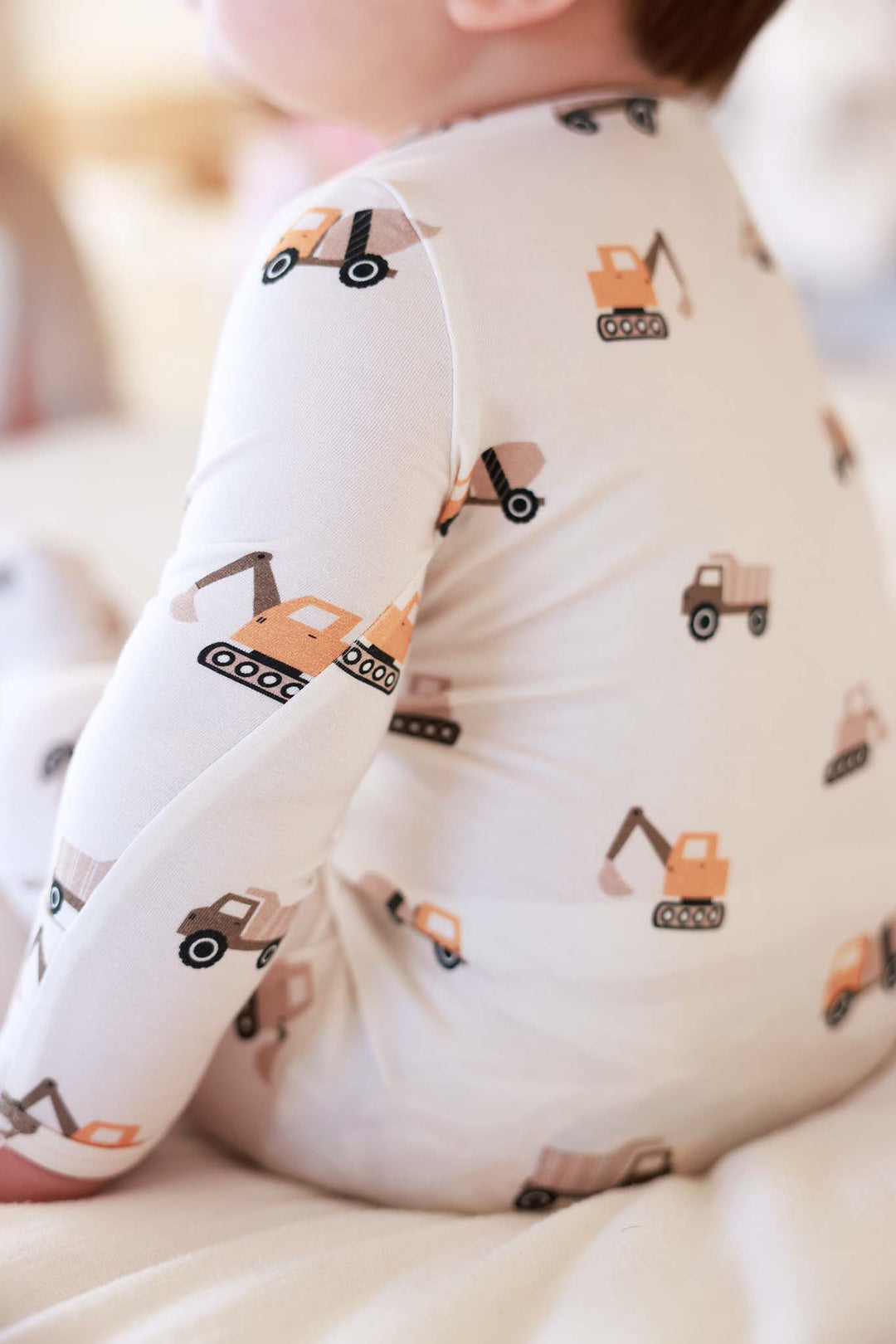 bulldozer and dump truck bamboo zipper footie for boys