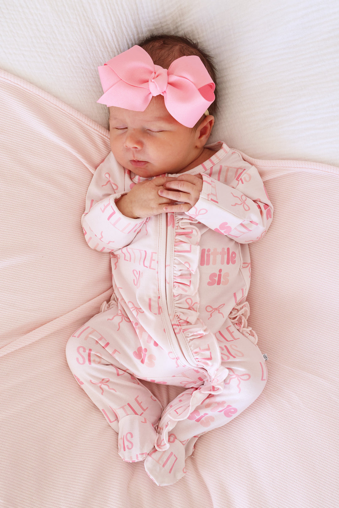 little sis bow bamboo ruffle zipper footie pajama with matching candy pink ribbon bow headband 