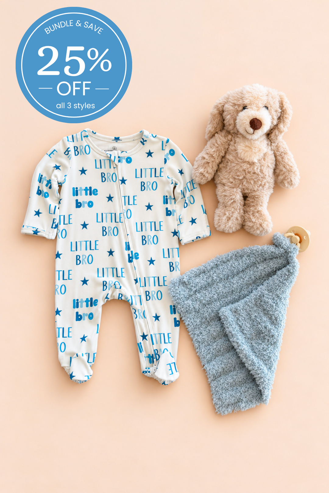A baby gift set featuring a Caden Lane white long-sleeve footed sleeper with blue 'Little Bro' text and star patterns, a soft blue textured lovey and a plush brown stuffed puppy, arranged on a peach background with a blue '25% OFF' sale badge.