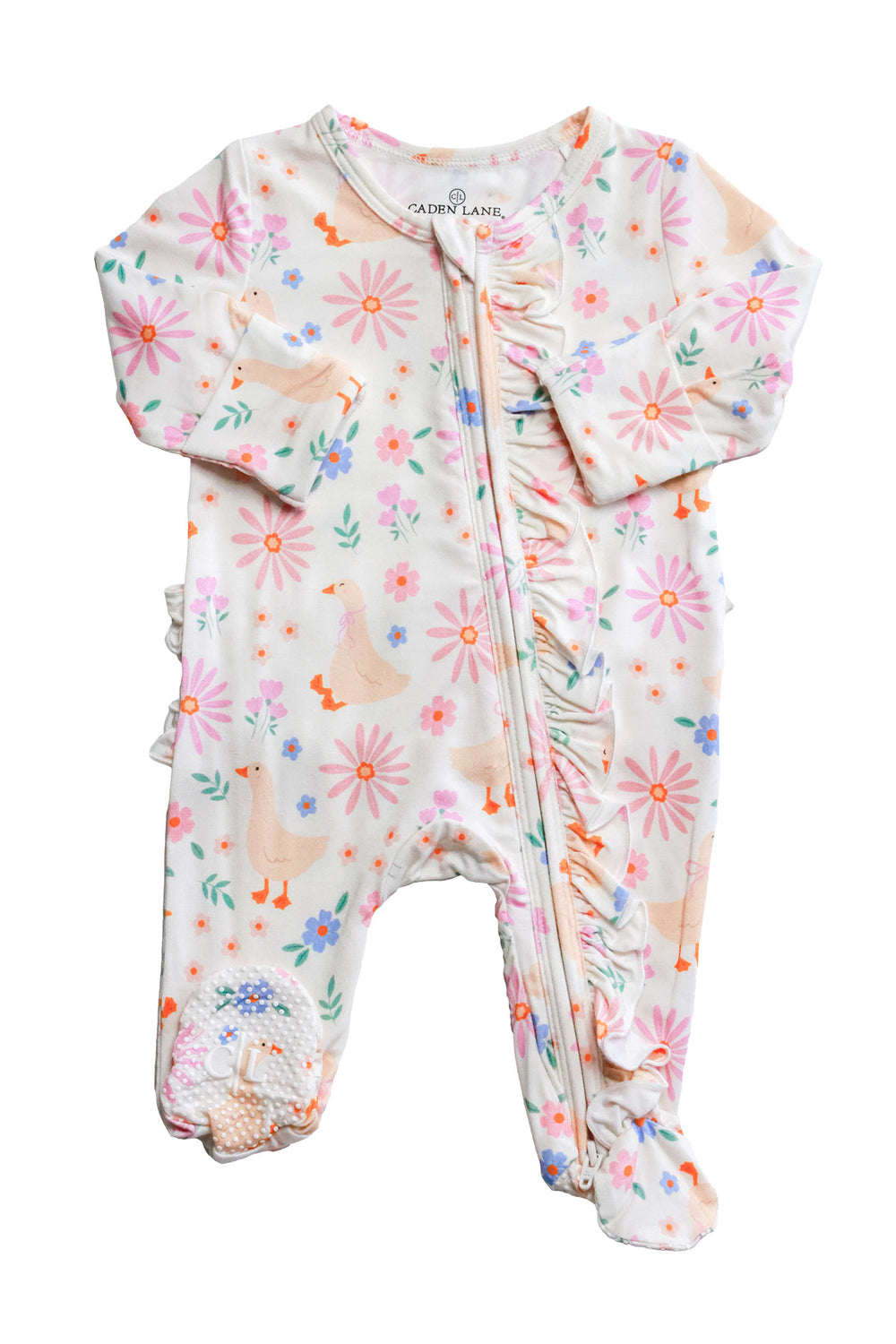 Lucy Goosy Ruffle Zipper Footie product flat lay showing the full garment with ruffle trim along the front zipper, floral duck print in cream and pink on a white background